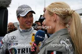 18.05.2008 Klettwitz, Germany,  Cora Schumacher (GER), wife of Ralf Schumacher (GER), interviewing her husband on the grid for DTM TV - DTM 2008 at Lausitzring