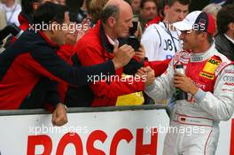 12.07.2008 Zandvoort, The Netherlands,  Dr. Wolfgang Ullrich (GER), Audi's Head of Sport and Hans-Jurgen Abt (GER), Teamchef Abt-Audi, congratulate Timo Scheider (GER), Audi Sport Team Abt, Portrait, with his second place in qualifying - DTM 2008 at Circuit Park Zandvoort