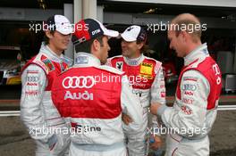 12.07.2008 Zandvoort, The Netherlands,  Audi driver Oliver Jarvis (GBR), Audi Sport Team Phoenix, Portrait, Mike Rockenfeller (GER), Audi Sport Team Rosberg, Portrait, Markus Winkelhock (GER), Audi Sport Team Rosberg, Portrait and Alexandre Premat (FRA), Audi Sport Team Phoenix, Portrait, chatting in the pitlane before the start of the qualifying session - DTM 2008 at Circuit Park Zandvoort