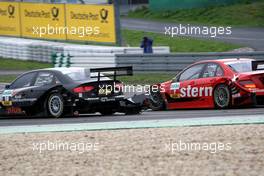 27.07.2008 Nürburg, Germany,  Incident with Gary Paffett (GBR), Persson Motorsport AMG Mercedes, AMG-Mercedes C-Klasse and Timo Scheider (GER), Audi Sport Team Abt, Audi A4 DTM. Both touched and Paffett got an official warning. Some aerodynamic parts flew off the car of Timo Scheider (GER), Audi Sport Team Abt, Audi A4 DTM - DTM 2008 at Nürburgring