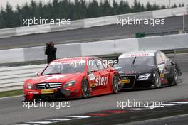 27.07.2008 Nürburg, Germany,  Incident with Gary Paffett (GBR), Persson Motorsport AMG Mercedes, AMG-Mercedes C-Klasse and Timo Scheider (GER), Audi Sport Team Abt, Audi A4 DTM. Both touched and Paffett got an official warning. Some aerodynamic parts flew off the car of Timo Scheider (GER), Audi Sport Team Abt, Audi A4 DTM - DTM 2008 at Nürburgring