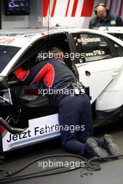 24.10.2008 Hockenheim, Germany,  Technician working at the inside of the car of Tom Kristensen (DNK), Audi Sport Team Abt, Audi A4 DTM - DTM 2008 at Hockenheimring, Germany
