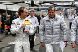 24.10.2008 Hockenheim, Germany,  (left) Mathias Lauda (AUT), Persson Motorsport AMG Mercedes, AMG Mercedes C-Klasse and (right) Bernd Schneider (GER), Team HWA AMG Mercedes, AMG Mercedes C-Klasse returning from the drivers briefing. - DTM 2008 at Hockenheimring, Germany