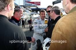 25.10.2008 Hockenheim, Germany,  Walking back from the parc fermé, Bernd Schneider (GER), received severable congratulations and slaps on the back, also from many Audi people to say goodbey on this last DTM weekend for Bernd. - DTM 2008 at Hockenheimring, Germany