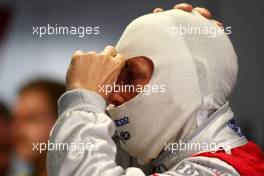 25.10.2008 Hockenheim, Germany,  Tom Kristensen (DNK), Audi Sport Team Abt, Audi A4 DTM adjusting his balaclave - DTM 2008 at Hockenheimring, Germany