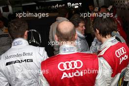 26.10.2008 Hockenheim, Germany,  On the occassion of the very last DTM race of Bernd Schneider, all the DTM drivers gathered in his pitbox. As as farewell present he received a customized golf card. (left) Paul di Resta (GBR), Team HWA AMG Mercedes, AMG Mercedes C-Klasse; (middle below) Alexandre Premat (FRA), Audi Sport Team Phoenix, Audi A4 DTM; (right) Oliver Jarvis (GBR), Audi Sport Team Phoenix, Audi A4 DTM and (middle centre) Norbert Haug (GER), Sporting Director Mercedes-Benz - DTM 2008 at Hockenheimring, Germany