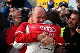 26.10.2008 Hockenheim, Germany,  A very emotional Dr. Wolfgang Ullrich (GER), Audi's Head of Sport hugging champion Timo Scheider (GER), Audi Sport Team Abt, Audi A4 DTM at the parc fermé. - DTM 2008 at Hockenheimring, Germany