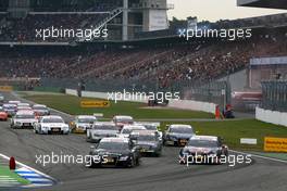 26.10.2008 Hockenheim, Germany,  Start of the race, with Timo Scheider (GER), Audi Sport Team Abt, Audi A4 DTM, having an excellent start, immediately overtaking Paul di Resta (GBR), Team HWA AMG Mercedes, AMG Mercedes C-Klasse. Mattias Ekström (SWE), Audi Sport Team Abt Sportsline, Audi A4 DTM, allows Scheider to take the lead at the first corner - DTM 2008 at Hockenheimring, Germany