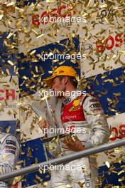 26.10.2008 Hockenheim, Germany,  Timo Scheider (GER), Audi Sport Team Abt, Audi A4 DTM kissing his 2008 DTM champions trophy. - DTM 2008 at Hockenheimring, Germany