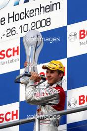 26.10.2008 Hockenheim, Germany,  Mattias Ekström (SWE), Audi Sport Team Abt Sportsline, Audi A4 DTM receiving his trophy for overall 3rd place this  2008 saison. - DTM 2008 at Hockenheimring, Germany