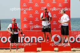 12.03.2008 Melbourne, Australia,  Lewis Hamilton (GBR), McLaren Mercedes, Heikki Kovalainen (FIN), McLaren Mercedes - Vodafone Mclaren Mercedes beach kayak race, Formula 1 World Championship, Rd 1, Australian Grand Prix, Wednesday