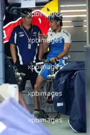 12.03.2008 Melbourne, Australia,  Mark Webber (AUS), Red Bull Racing in the garage on his bike - Formula 1 World Championship, Rd 1, Australian Grand Prix, Wednesday