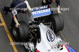 18.11.2008 Barcelona, Spain,  As BMW runs KERS the mechanics wear special gloves to touch the car and to minimize risk of electrical accidents, Nick Heidfeld (GER), BMW Sauber F1 Team, Interim 2009 car, detail - Formula 1 Testing, Barcelona
