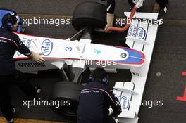 18.11.2008 Barcelona, Spain,  As BMW runs KERS the mechanics wear special gloves to touch the car and to minimize risk of electrical accidents, Nick Heidfeld (GER), BMW Sauber F1 Team, Interim 2009 car, detail - Formula 1 Testing, Barcelona