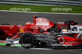 07.09.2008 Francorchamps, Belgium,  Kimi Raikkonen (FIN), Räikkönen, Scuderia Ferrari, F2008 overtakes  Lewis Hamilton (GBR), McLaren Mercedes, MP4-23 - Formula 1 World Championship, Rd 13, Belgian Grand Prix, Sunday Race