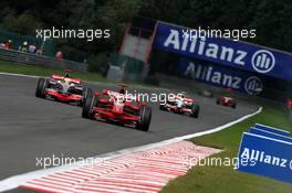 07.09.2008 Francorchamps, Belgium,  Kimi Raikkonen (FIN), Räikkönen, Scuderia Ferrari, F2008 leads Lewis Hamilton (GBR), McLaren Mercedes, MP4-23 - Formula 1 World Championship, Rd 13, Belgian Grand Prix, Sunday Race