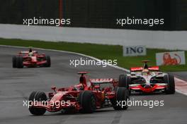 07.09.2008 Francorchamps, Belgium,  Kimi Raikkonen (FIN), Räikkönen, Scuderia Ferrari, F2008 and Lewis Hamilton (GBR), McLaren Mercedes, MP4-23 - Formula 1 World Championship, Rd 13, Belgian Grand Prix, Sunday Race