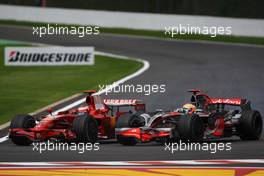 07.09.2008 Francorchamps, Belgium,  Kimi Raikkonen (FIN), Räikkönen, Scuderia Ferrari, F2008 overtakes  Lewis Hamilton (GBR), McLaren Mercedes, MP4-23 - Formula 1 World Championship, Rd 13, Belgian Grand Prix, Sunday Race