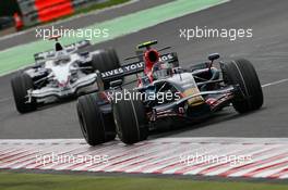 07.09.2008 Francorchamps, Belgium,  Sebastian Vettel (GER), Scuderia Toro Rosso, STR02 leads Nick Heidfeld (GER), BMW Sauber F1 Team, F1.08 - Formula 1 World Championship, Rd 13, Belgian Grand Prix, Sunday Race