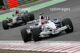 07.09.2008 Francorchamps, Belgium,  Robert Kubica (POL), BMW Sauber F1 Team, F1.08 leads Sebastian Vettel (GER), Scuderia Toro Rosso, STR02 - Formula 1 World Championship, Rd 13, Belgian Grand Prix, Sunday Race