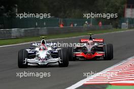 07.09.2008 Francorchamps, Belgium,  Robert Kubica (POL), BMW Sauber F1 Team, F1.08 leads Heikki Kovalainen (FIN), McLaren Mercedes, MP4-23 - Formula 1 World Championship, Rd 13, Belgian Grand Prix, Sunday Race