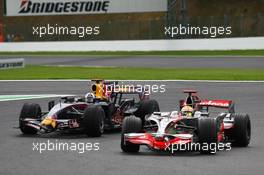 07.09.2008 Francorchamps, Belgium,  Lewis Hamilton (GBR), McLaren Mercedes, MP4-23 passes David Coulthard (GBR), Red Bull Racing, RB4 - Formula 1 World Championship, Rd 13, Belgian Grand Prix, Sunday Race