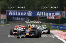 Francorchamps, Belgium,  David Coulthard (GBR), Red Bull Racing leads Adrian Sutil (GER), Force India F1 Team and Jenson Button (GBR), Honda Racing F1 Team - Formula 1 World Championship, Rd 13, Belgian Grand Prix, Sunday Race
