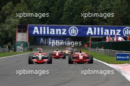 07.09.2008 Francorchamps, Belgium,  Kimi Raikkonen (FIN), Räikkönen, Scuderia Ferrari overtakes Lewis Hamilton (GBR), McLaren Mercedes - Formula 1 World Championship, Rd 13, Belgian Grand Prix, Sunday Race