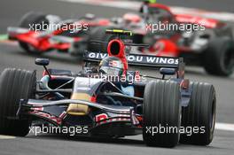 07.09.2008 Francorchamps, Belgium,  Sebastian Vettel (GER), Scuderia Toro Rosso, STR02 leads Heikki Kovalainen (FIN), McLaren Mercedes, MP4-23 - Formula 1 World Championship, Rd 13, Belgian Grand Prix, Sunday Race