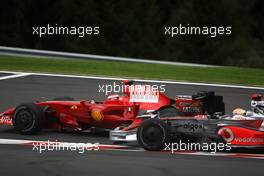 07.09.2008 Francorchamps, Belgium,  Kimi Raikkonen (FIN), Räikkönen, Scuderia Ferrari, F2008 overtakes  Lewis Hamilton (GBR), McLaren Mercedes, MP4-23 - Formula 1 World Championship, Rd 13, Belgian Grand Prix, Sunday Race