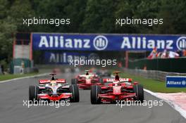 07.09.2008 Francorchamps, Belgium,  Kimi Raikkonen (FIN), Räikkönen, Scuderia Ferrari overtakes Lewis Hamilton (GBR), McLaren Mercedes - Formula 1 World Championship, Rd 13, Belgian Grand Prix, Sunday Race