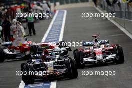 06.09.2008 Francorchamps, Belgium,  Sebastian Vettel (GER), Scuderia Toro Rosso, STR03 and Jarno Trulli (ITA), Toyota Racing, TF108 - Formula 1 World Championship, Rd 13, Belgian Grand Prix, Saturday Qualifying