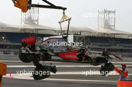 04.04.2008 Sakhir, Bahrain,  Crash damaged Lewis Hamilton (GBR), McLaren Mercedes, MP4-23 - Formula 1 World Championship, Rd 3, Bahrain Grand Prix, Friday Practice