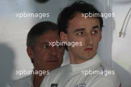 04.04.2008 Sakhir, Bahrain,  Robert Kubica (POL),  BMW Sauber F1 Team and his manager, Daniele Morelli - Formula 1 World Championship, Rd 3, Bahrain Grand Prix, Friday Practice