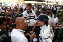 06.04.2008 Sakhir, Bahrain,  Robert Kubica (POL),  BMW Sauber F1 Team being interviewed - Formula 1 World Championship, Rd 3, Bahrain Grand Prix, Sunday Pre-Race Grid