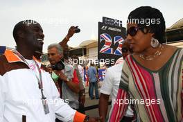 06.04.2008 Sakhir, Bahrain,  Akon (USA), Hip Hop / R&B Music Artist with Macy Gray (USA) R&B Soul music artist - Formula 1 World Championship, Rd 3, Bahrain Grand Prix, Sunday Pre-Race Grid