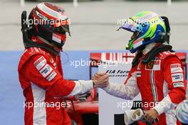 06.04.2008 Sakhir, Bahrain,  Kimi Raikkonen (FIN), Räikkönen, Scuderia Ferrari and Felipe Massa (BRA), Scuderia Ferrari - Formula 1 World Championship, Rd 3, Bahrain Grand Prix, Sunday Podium