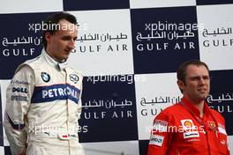 06.04.2008 Sakhir, Bahrain,  Robert Kubica (POL),  BMW Sauber F1 Team and Stefano Domenicali (ITA), Scuderia Ferrari, Sporting Director - Formula 1 World Championship, Rd 3, Bahrain Grand Prix, Sunday Podium