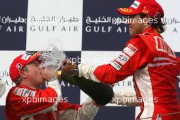 06.04.2008 Sakhir, Bahrain,  Winner, 1st, Felipe Massa (BRA), Scuderia Ferrari and 2nd Kimi Raikkonen (FIN), Räikkönen, Scuderia Ferrari - Formula 1 World Championship, Rd 3, Bahrain Grand Prix, Sunday Podium