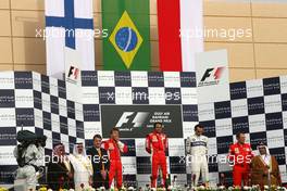 06.04.2008 Sakhir, Bahrain,  Kimi Raikkonen (FIN), Räikkönen, Scuderia Ferrari, Felipe Massa (BRA), Scuderia Ferrari, Robert Kubica (POL), BMW Sauber F1 Team - Formula 1 World Championship, Rd 3, Bahrain Grand Prix, Sunday Podium