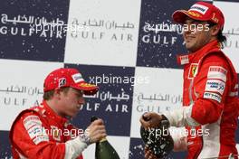 06.04.2008 Sakhir, Bahrain,  Winner, 1st, Felipe Massa (BRA), Scuderia Ferrari, and Kimi Raikkonen (FIN), Räikkönen, Scuderia Ferrari - Formula 1 World Championship, Rd 3, Bahrain Grand Prix, Sunday Podium