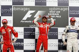 06.04.2008 Sakhir, Bahrain,  Felipe Massa (BRA), Scuderia Ferrari, Kimi Raikkonen (FIN), Räikkönen, Scuderia Ferrari, Robert Kubica (POL),  BMW Sauber F1 Team - Formula 1 World Championship, Rd 3, Bahrain Grand Prix, Sunday Podium