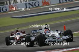 06.04.2008 Sakhir, Bahrain,  Robert Kubica (POL), BMW Sauber F1 Team, F1.08 leads Anthony Davidson (GBR), Super Aguri F1 Team, SA08 - Formula 1 World Championship, Rd 3, Bahrain Grand Prix, Sunday Race