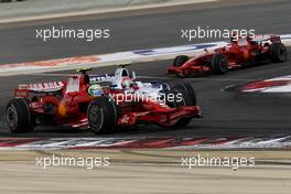 06.04.2008 Sakhir, Bahrain,  Felipe Massa (BRA), Scuderia Ferrari, F2008 and Kimi Raikkonen (FIN), Räikkönen, Scuderia Ferrari, F2008 - Formula 1 World Championship, Rd 3, Bahrain Grand Prix, Sunday Race