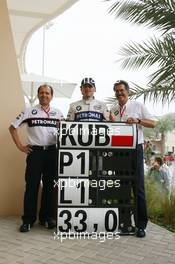 05.04.2008 Sakhir, Bahrain,  Willy Rampf (SUI) BMW Sauber F1 Techincal Director with Robert Kubica (POL),  BMW Sauber F1 Team and Dr. Mario Theissen (GER), BMW Sauber F1 Team, BMW Motorsport Director - Formula 1 World Championship, Rd 3, Bahrain Grand Prix, Saturday Qualifying