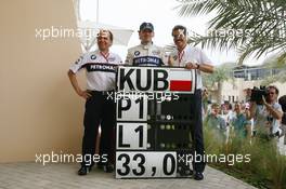 05.04.2008 Sakhir, Bahrain,  Willy Rampf (SUI) BMW Sauber F1 Techincal Director with Robert Kubica (POL),  BMW Sauber F1 Team and Dr. Mario Theissen (GER), BMW Sauber F1 Team, BMW Motorsport Director - Formula 1 World Championship, Rd 3, Bahrain Grand Prix, Saturday Qualifying