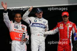 05.04.2008 Sakhir, Bahrain,  Lewis Hamilton (GBR), McLaren Mercedes with pole sitter Robert Kubica (POL),  BMW Sauber F1 Team and Felipe Massa (BRA), Scuderia Ferrari - Formula 1 World Championship, Rd 3, Bahrain Grand Prix, Saturday Qualifying