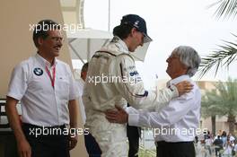05.04.2008 Sakhir, Bahrain,  Robert Kubica (POL),  BMW Sauber F1 Team is congratulated by Bernie Ecclestone (GBR) for getting pole position - Formula 1 World Championship, Rd 3, Bahrain Grand Prix, Saturday Qualifying