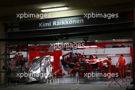 03.04.2008 Sakhir, Bahrain,  Kimi Raikkonen (FIN), Räikkönen, Scuderia Ferrari in the garage at night - Formula 1 World Championship, Rd 3, Bahrain Grand Prix, Thursday