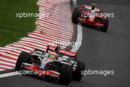 31.10.2008 Sao Paulo, Brazil,  Lewis Hamilton (GBR), McLaren Mercedes, MP4-23 and Felipe Massa (BRA), Scuderia Ferrari, F2008 - Formula 1 World Championship, Rd 18, Brazilian Grand Prix, Friday Practice